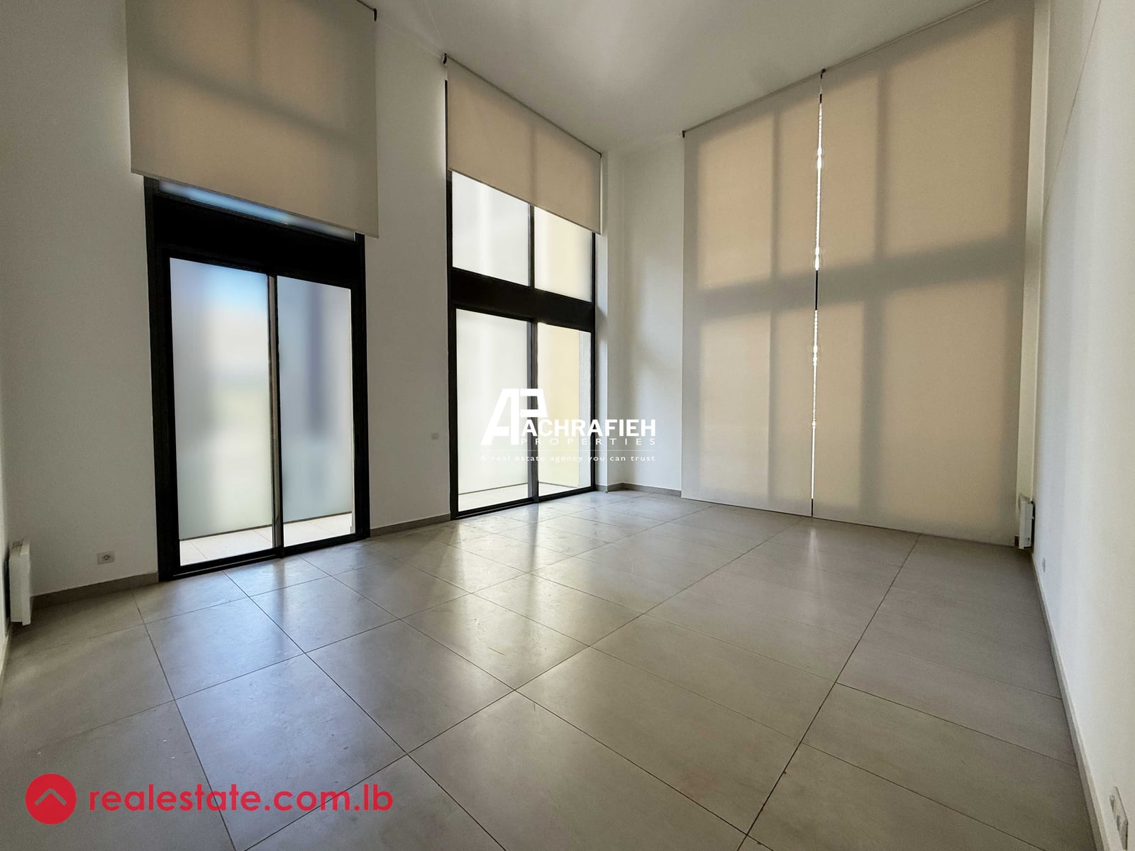 High Ceiling | Shared Gym & Pool | Apartment for Sale In Achrafieh — Hub Realtors