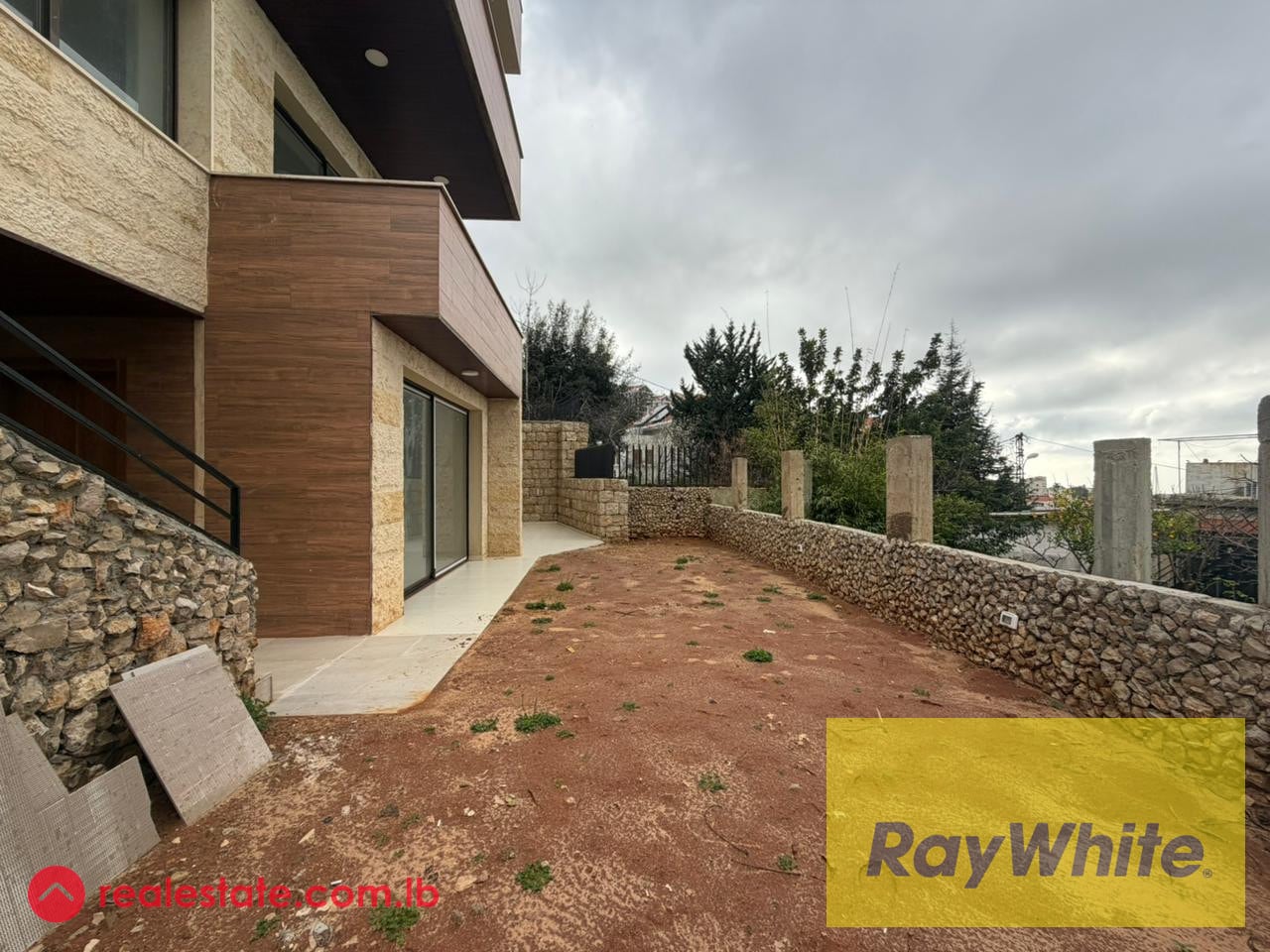 Apartment with garden for sale in Jouret el Ballout — Hub Realtors