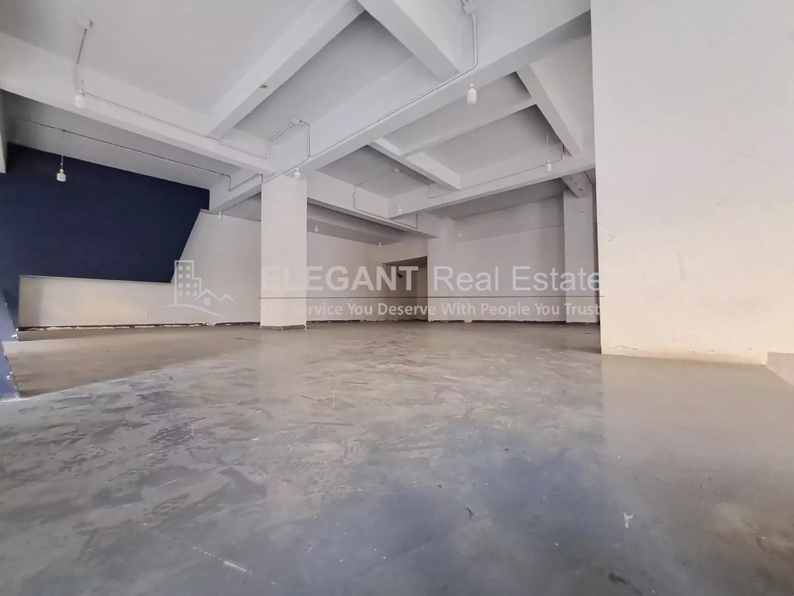 Big Showroon with Warehouse | Easy Access | Prime Location — Hub Realtors