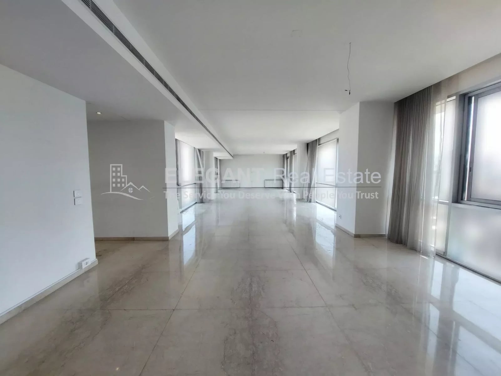 Spacious with Panoramic Sea View & 24/7 Electricity | For Rent | Achrafieh — Hub Realtors